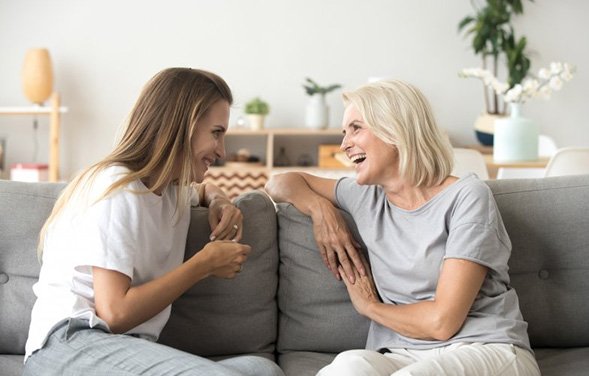Ladies converse on couch