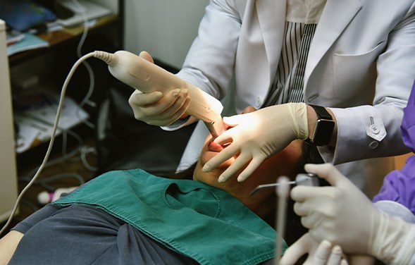 Close-up of intraoral camera being used for oral cancer screening in Tulsa