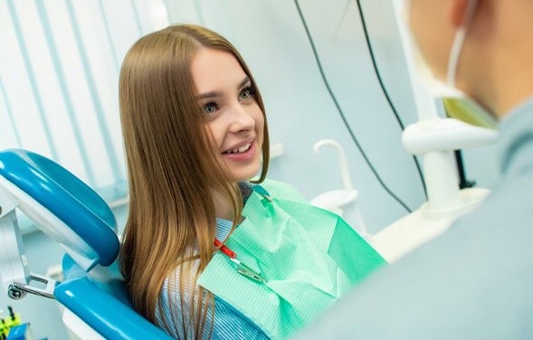 Patient in Tulsa receiving a talk after oral cancer screening