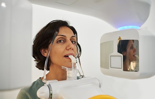Dentist performing surgery
