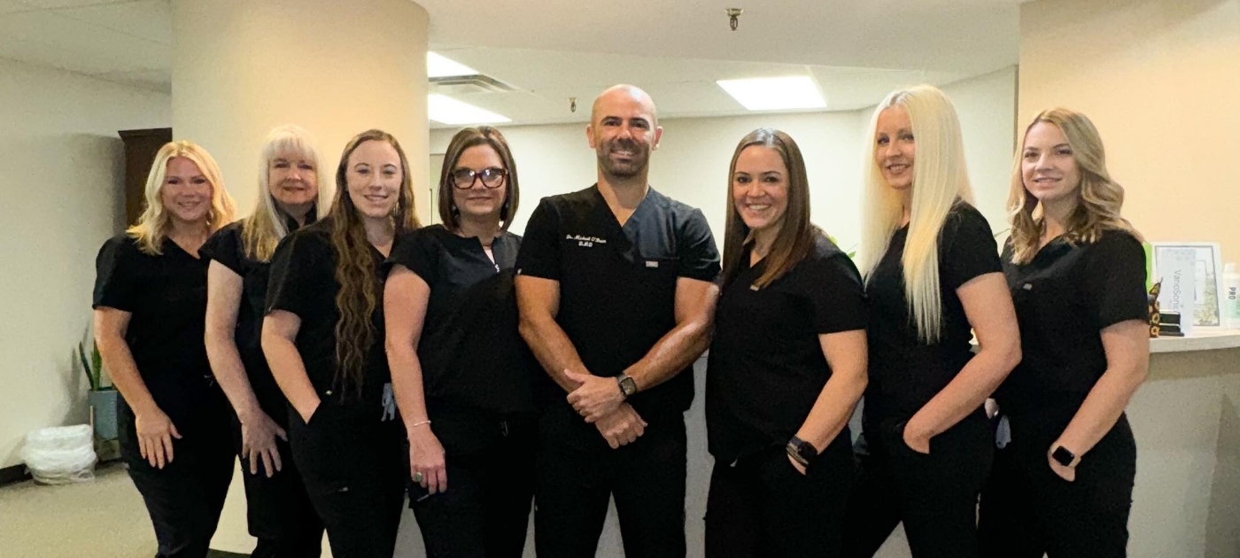 Tulsa dentist and dental team members at O'Brien Dental Wellness Center